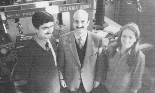 Prof. Marco Somalvico, prf. Giuseppina Gini and another researcher with the first industrial robot brought from industry to university in Italy (Sigma robot by Olivetti then becomed SuperSigma).